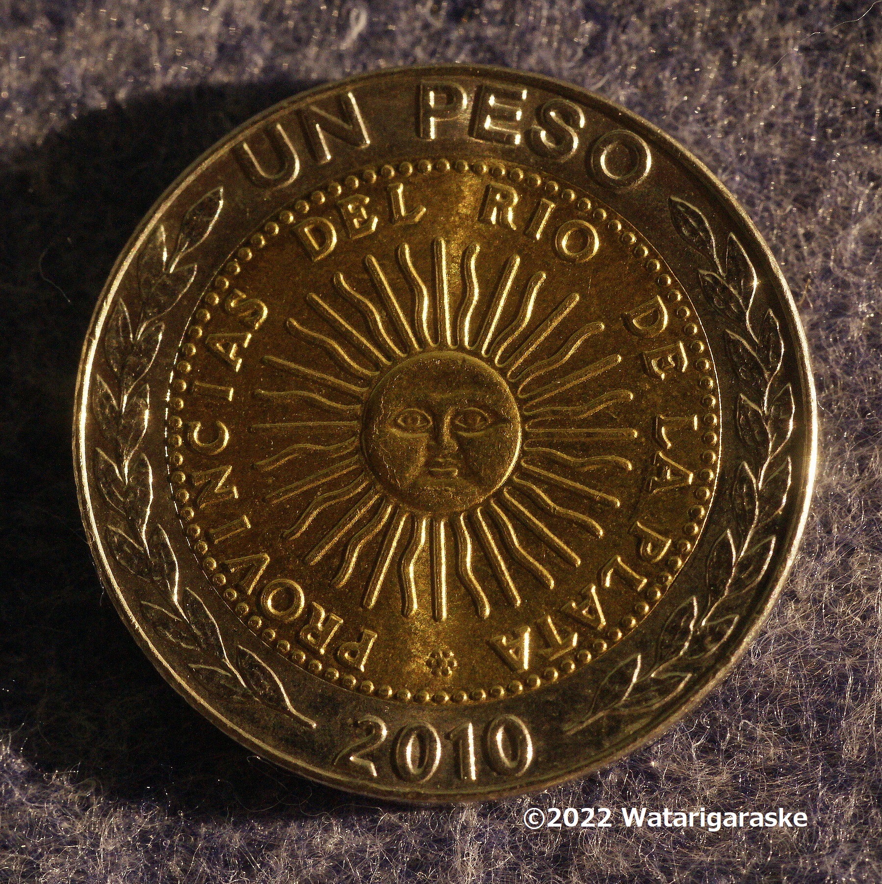 イケてる太陽神デザインのアルゼンチンコイン　旧１ペソ
